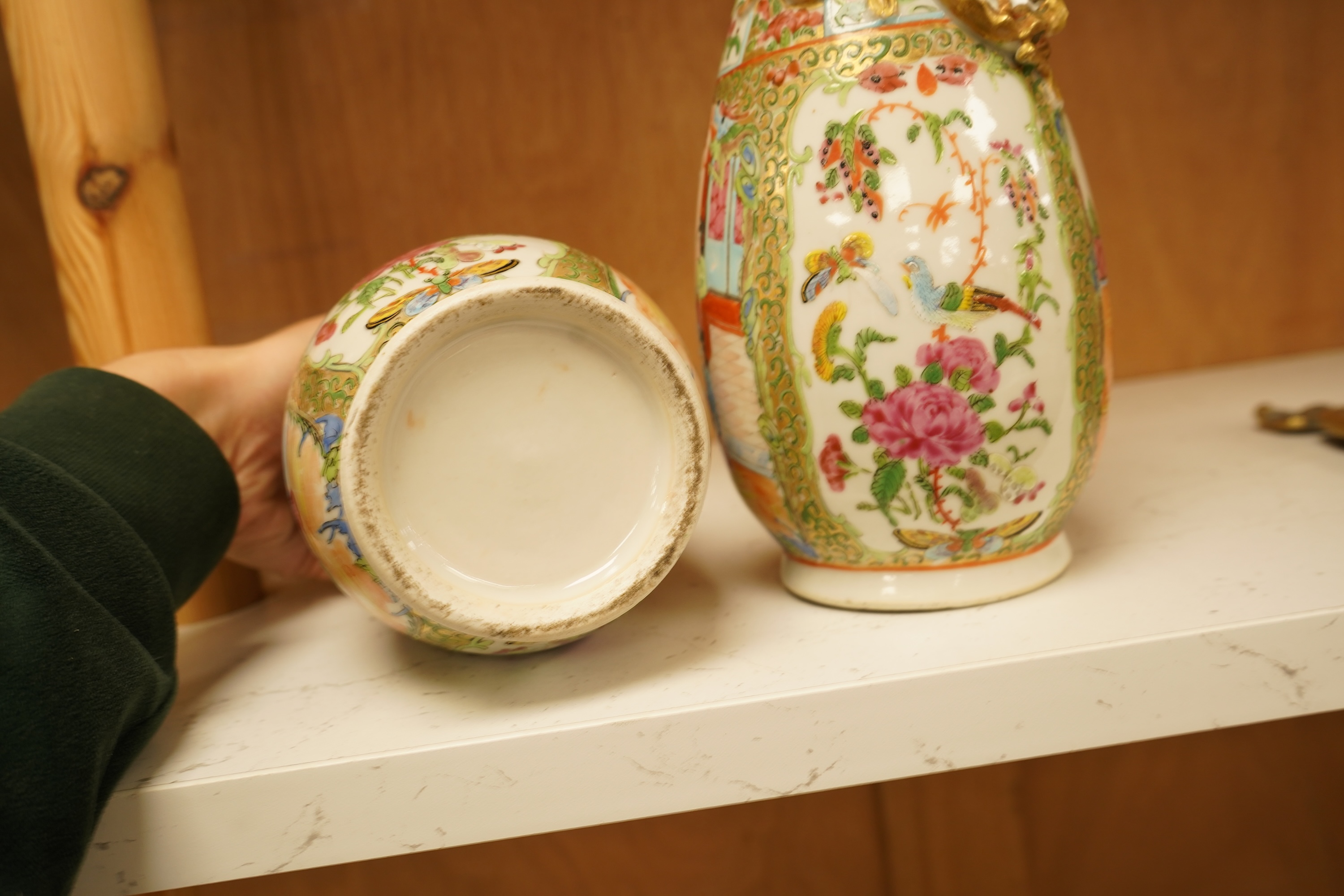 A pair of 19th century Chinese famille rose vases, 25cm